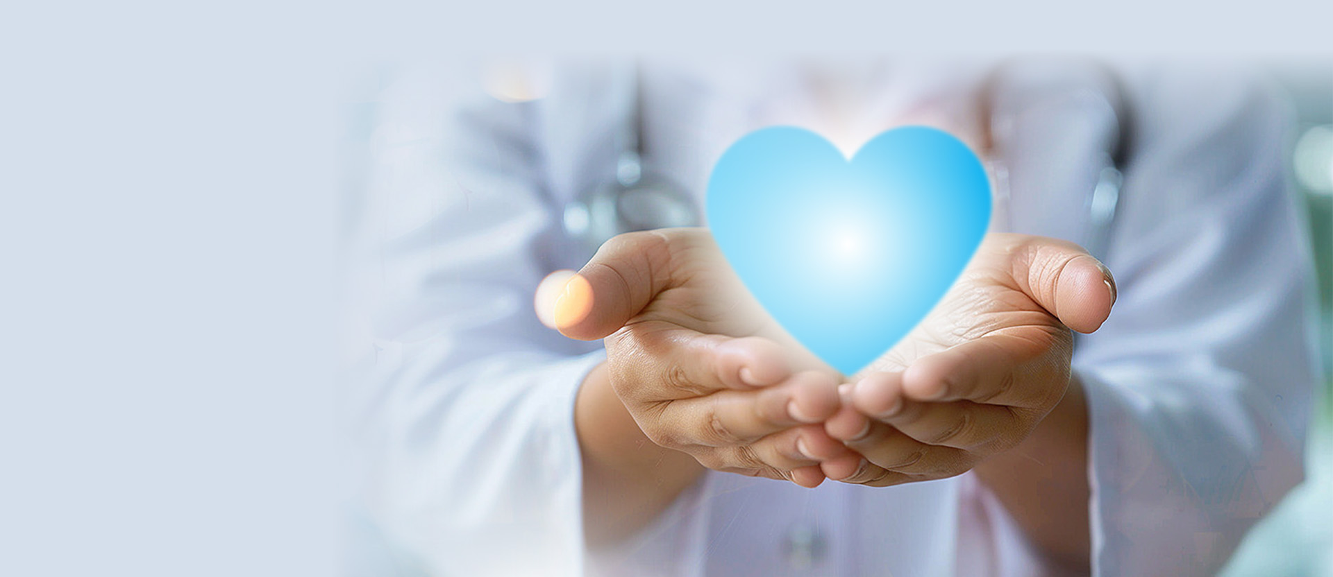 Doctor holding heart icon